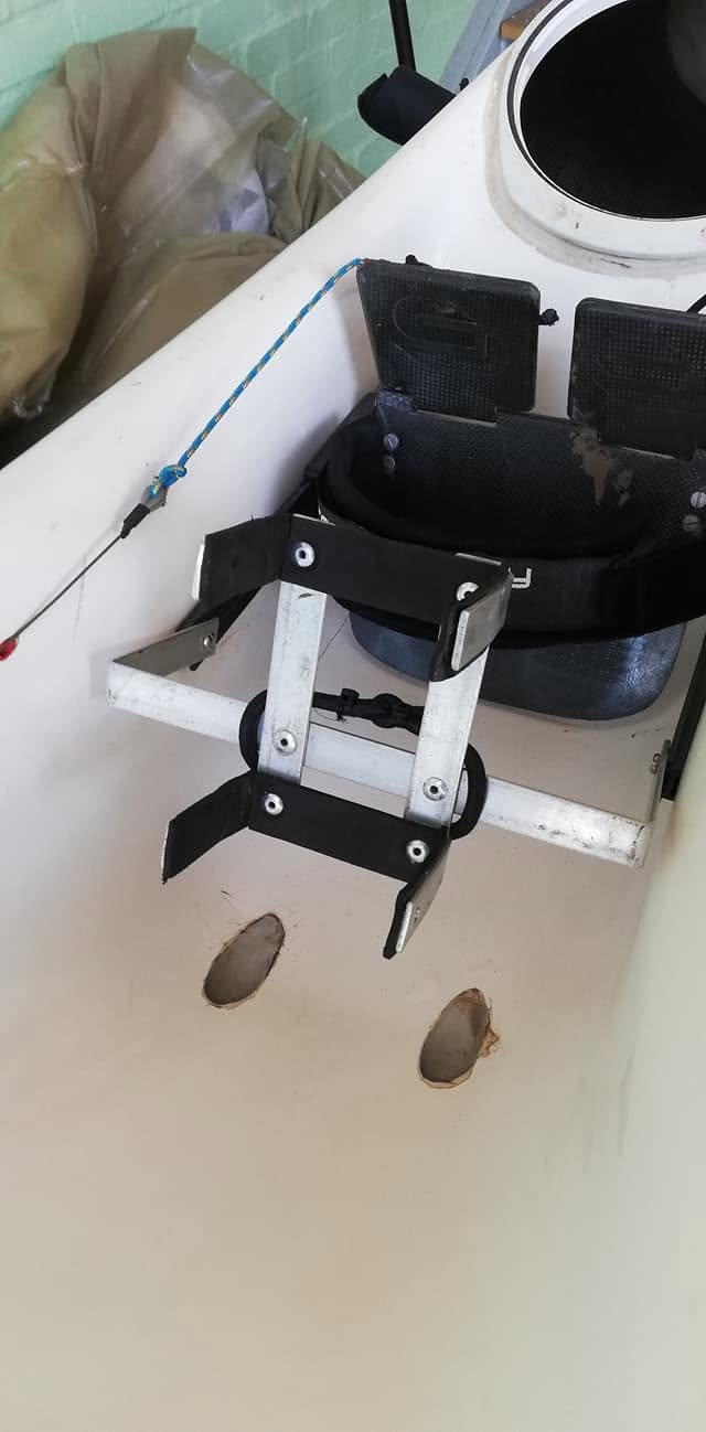 Cellphone and battery bank cradle, able to swing forward and back to adjust the viewing angle