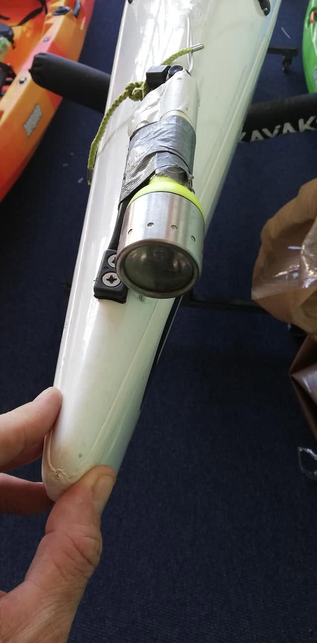 Flashlight taped to the front handle
