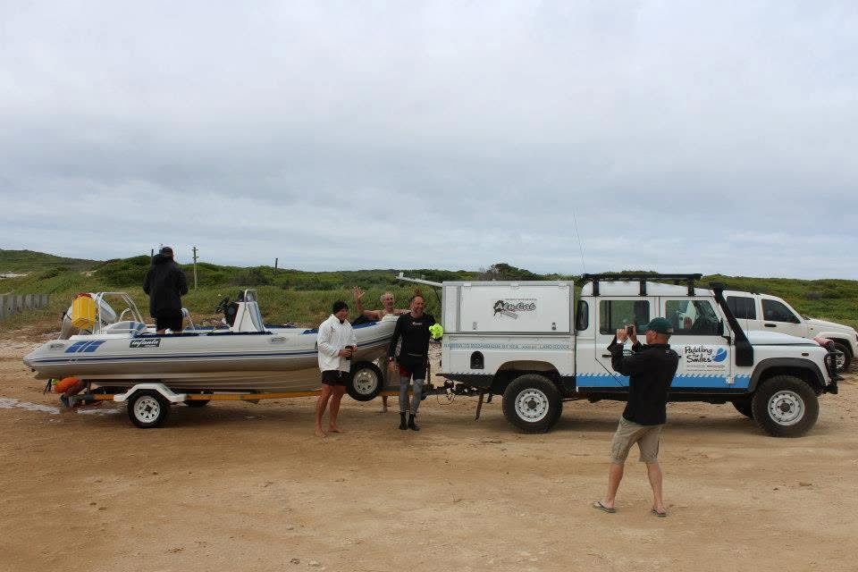 Support crew and NSRI-checked RIB boat marked 'Infanta' welcoming Richard at Cape Infanta