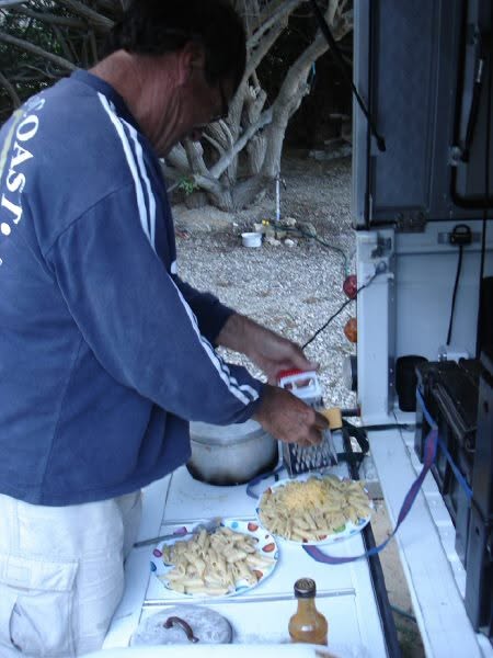 Cooking dinner at the Holgat camp kitchen