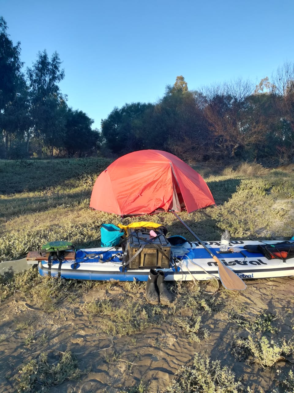 Wide view of the tent and loaded board at the day 1 campsite